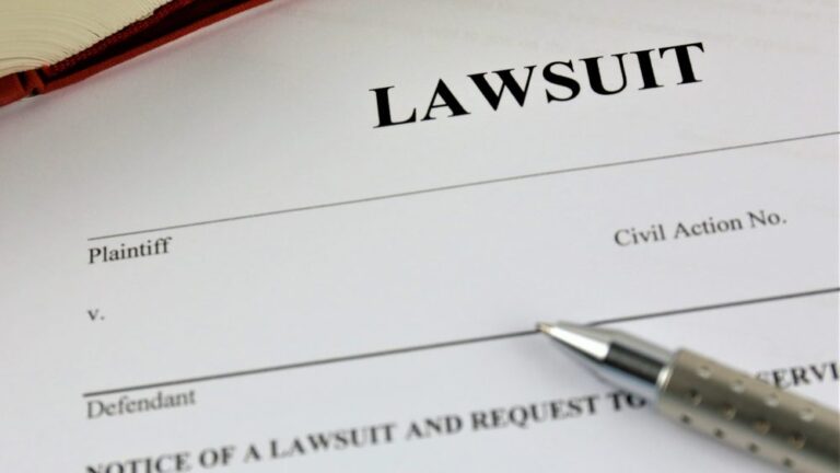 Lawsuit paperwork with a pen