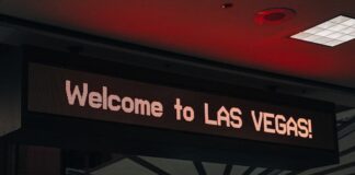 MGM’s CEO Says Las Vegas ‘Not Broken’ Despite Tourism Declines Digital airport sign reading “Welcome to Las Vegas”