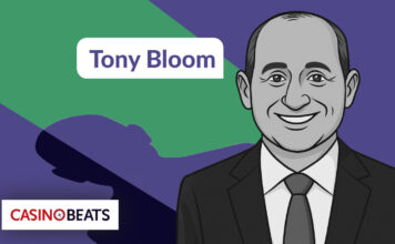 Tony Bloom Net Worth and How He Earned His Nickname Illustration of a smiling man in a suit on a purple and green background. Text reads "Tony Bloom"