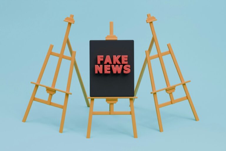A rendered image of an easel with Fake News written on it