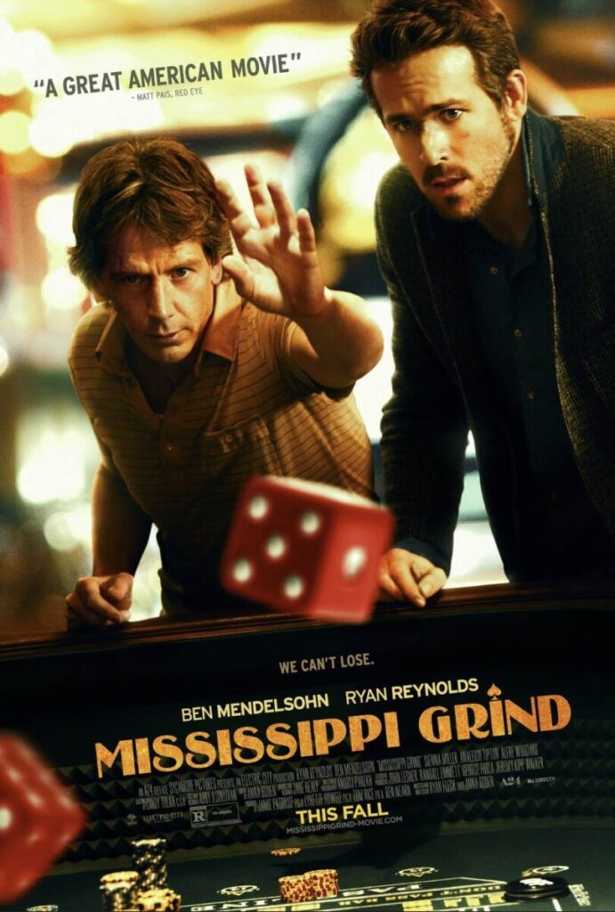 Gerry (Ben Mendelsohn) reaches toward the camera as Curtis (Ryan Reynolds) stands beside him, red dice flying over a casino table, tagline “We can’t lose.”