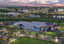 Rendering of the Cedar Crossing Casino exterior with parking lot and riverfront backdrop
