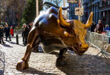 DraftKings Launching Sports Prediction Markets By End of 2025 Wall Street Charging Bull statue.