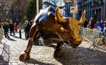 DraftKings Launching Sports Prediction Markets By End of 2025 Wall Street Charging Bull statue.