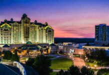 Fire at Foxwoods Casino Steakhouse Sparks Five-Alarm Response; Three Firefighters Hospitalized Foxwoods Resort Casino at sunset with the Grand Pequot Tower and Fox Tower illuminated.