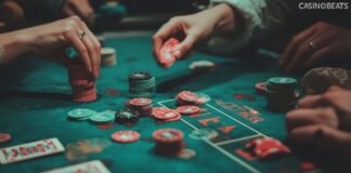 People playing at a blackjack table at casino