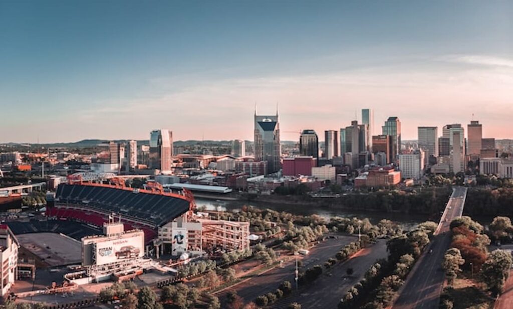 Nashville skyline with Nissan Stadium at sunset.