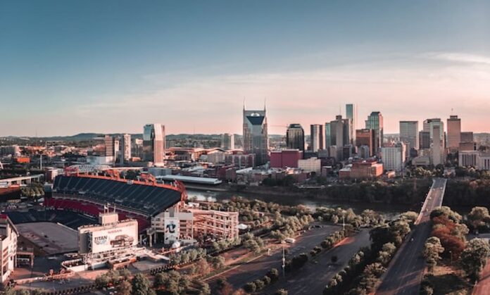 Nashville skyline with Nissan Stadium at sunset.
