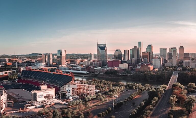 Nashville skyline with Nissan Stadium at sunset.