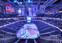 NHL Commissioner Says Prediction-Market Partnerships Give League ‘Control’ Empty NHL arena before a Stanley Cup Final game, lit in blue with team banners hanging overhead.