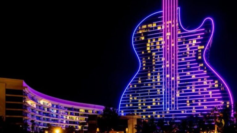 Seminole Hard Rock Hotel & Casino guitar-shaped tower illuminated at night in Florida