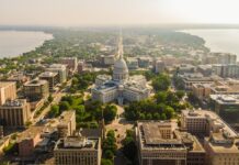 Wisconsin Senate Committee Advances Tribal Sports Betting Bill as Major Operators Push Back Aerial view of the Wisconsin State Capitol in Madison.