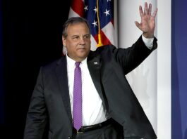 Chris Christie Joins American Gaming Association, Calls Sports Prediction Markets Illegal Former New Jersey Governor Chris Christie waves while speaking at a political event in Las Vegas.