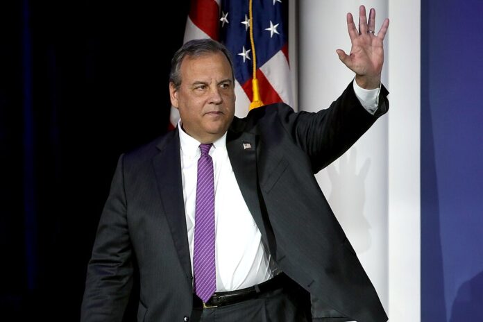 Chris Christie Joins American Gaming Association, Calls Sports Prediction Markets Illegal Former New Jersey Governor Chris Christie waves while speaking at a political event in Las Vegas.