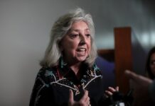 Rep. Dina Titus Pushes for Fast-Track Hearing on FAIR BET Gambling Tax Fix Rep. Dina Titus speaks to reporters while gesturing with her hands during a press conference.