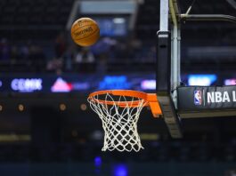 Milliseconds Matter: Why Inside Information is Sports Betting’s Biggest Vulnerability A basketball approaches the rim during an NBA game.