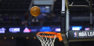 Milliseconds Matter: Why Inside Information is Sports Betting’s Biggest Vulnerability A basketball approaches the rim during an NBA game.