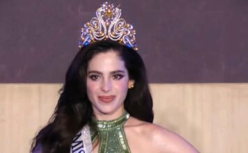 Miss Universe 2025, Fátima Bosch, wearing a green gown and crown during a coronation appearance.