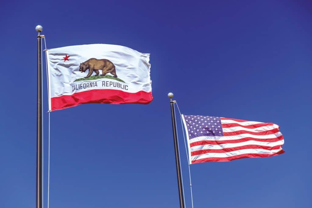 California and USA flags waving next to each other