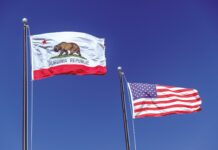 California and USA flags waving next to each other