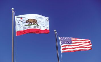California and USA flags waving next to each other