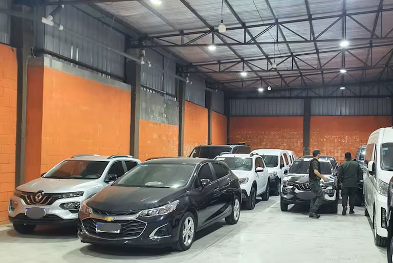 Vehicles confiscated during the police raid.