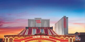 Circus Circus Bets on Nostalgia With New Bingo Hall & Expanded Coin-Operated Slots Exterior view of Circus Circus Las Vegas at dusk, showing the illuminated marquee and hotel towers