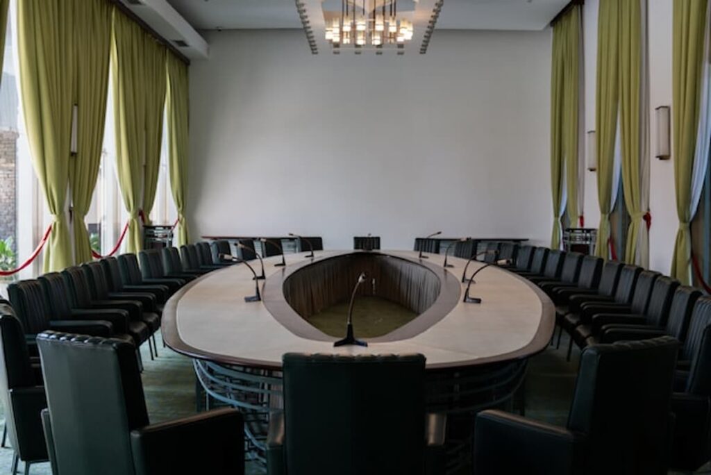 Empty conference room prepared for a regulatory meeting on gaming policy