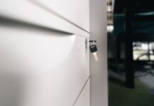 Light & Wonder Challenges Court Order on Privileged Materials in Aristocrat Trade-Secrets Case Close-up of a locked office drawer with a key hanging from the lock