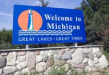 Hard Rock Bet’s Michigan Launch Caps Nearly Two-Year Push Triggered by 888 Deal Blue “Welcome to Michigan” road sign with a lighthouse illustration and the slogan Great Lakes Great Times.