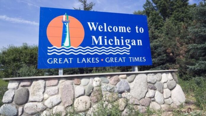 Hard Rock Bet’s Michigan Launch Caps Nearly Two-Year Push Triggered by 888 Deal Blue “Welcome to Michigan” road sign with a lighthouse illustration and the slogan Great Lakes Great Times.