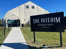Norfolk Temporary Casino Posts Modest Early Revenue Sign outside the Interim Gaming Hall temporary casino in Norfolk, Virginia, showing the entrance to the slot-only gaming facility.