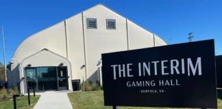 Norfolk Temporary Casino Posts Modest Early Revenue Sign outside the Interim Gaming Hall temporary casino in Norfolk, Virginia, showing the entrance to the slot-only gaming facility.