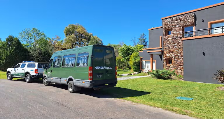 Police vehicles outside the property during a raid earlier this year.