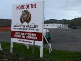 Scotts Valley Confirms Temporary Preview Casino in Vallejo Amid Federal Review Sign marking land belonging to the Scotts Valley Band of Pomo Indians, with modular buildings in the background