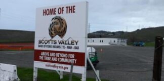 Scotts Valley Confirms Temporary Preview Casino in Vallejo Amid Federal Review Sign marking land belonging to the Scotts Valley Band of Pomo Indians, with modular buildings in the background