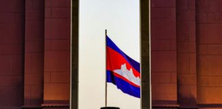 Lions Used For Torture At Cambodian Casino Renamed Merry and Christmas After Dec 25 Rescue Cambodian flag