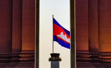 Lions Used For Torture At Cambodian Casino Renamed Merry and Christmas After Dec 25 Rescue Cambodian flag