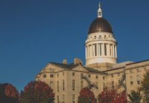 Autumn sunset view of the Maine State Legislature building in Augusta, Maine.