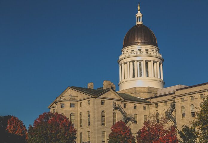 Autumn sunset view of the Maine State Legislature building in Augusta, Maine.