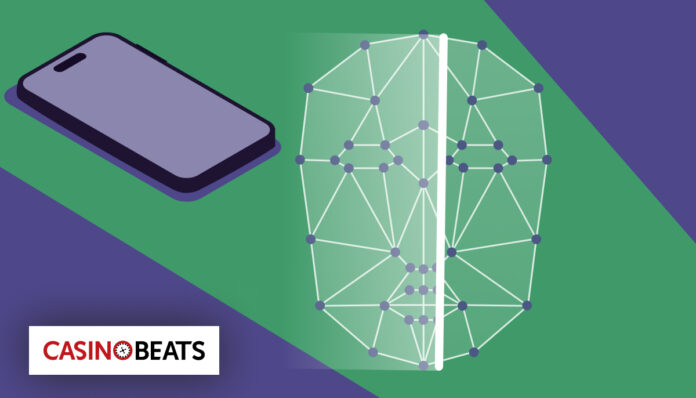 Smartphone and a split digital human face graphic illustrating AI-powered facial recognition technology used by casinos to monitor players and support safer gambling practices.