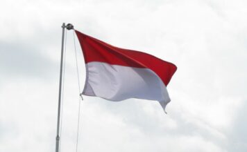 Indonesian Man Faked Violent Robbery to Mask Online Casino Losses Indonesian flag