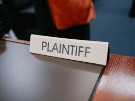 Illinois Class Action Alleges Kalshi Operates Illegal Gambling Platform A courtroom placard reading ‘Plaintiff’ sits on a table during a legal proceeding.