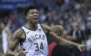 Giannis Antetokounmpo celebrates during a Milwaukee Bucks game.