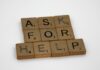 NCPG Calls on Prediction Markets to Promote National Problem Gambling Helpline Wooden letter tiles spelling “ask for help” on a white background
