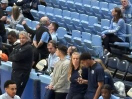 Caleb Wilson with hand in a cast