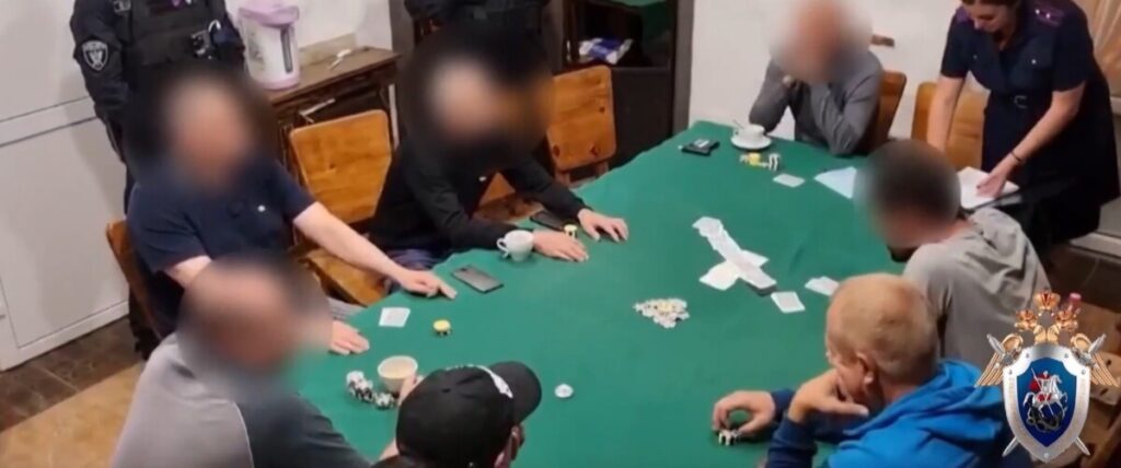 Russian Federal Security Service and Ministry of Internal Affairs officers raid an illegal poker club in the city of Smolensk in 2024.