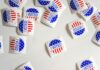Associated Press Will Provide Election Data to Kalshi Ahead of 2026 Midterms “I Voted” stickers scattered on a white surface during a U.S. election.