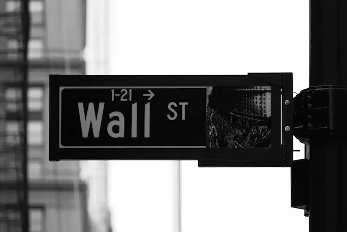 The Wall St street sign in black and white.