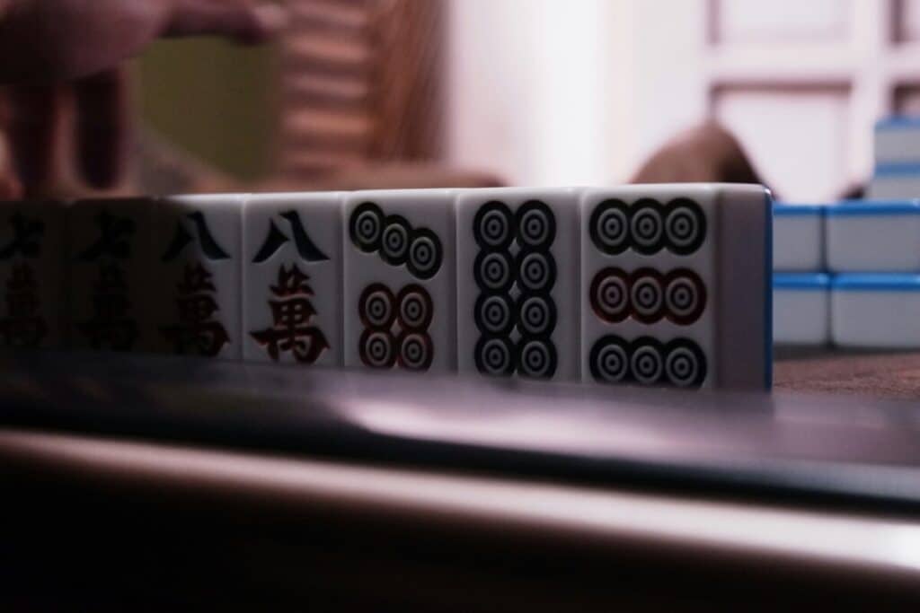 Chinese gamblers often use mahjong tiles to play tui bing zi.